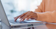 © peopleimages.com - Hands, typing and woman with laptop by desk in home with freelance project for creative startup. Technology, communication and closeup of female pr entrepreneur with online email report for client.