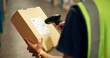 © Nina2024/peopleimages.com - Employee, hands and box with scanner at warehouse for product, stocktaking and distribution. Manufacturing, person and barcode for delivery or package for supplier, supply chain and logistics