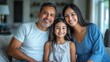 © CStock - A father, mother, and daughter posing for a portrait at home,