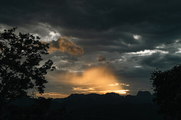 Wall Mural - majestic mountain at sunset with sky and cloudscape, beautiful landscape captured in the evening lig