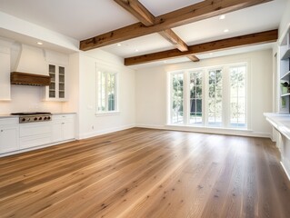 Wall Mural - This living room is mid-renovation, showcasing freshly painted white walls and hardwood floors. Large windows illuminate the space, highlighting the open-concept design and exposed beams