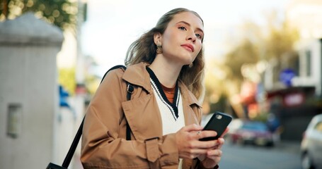 Poster - Woman, phone and waiting in street to travel with taxi app, transport and morning commute in city. Professional, person and smartphone for cab location, trip details and ride service on road sidewalk