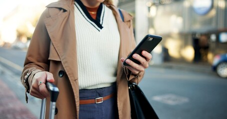 Poster - Woman, phone and hands with luggage in street to travel with taxi app, transport and commute in city. Professional, person and smartphone for cab location, trip details and ride service on sidewalk