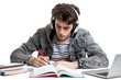 © KING OF PNG - PNG Images, Young student concentrating while studying with headphones, Transparent background.