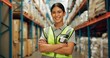 © Nina2024/peopleimages.com - Portrait, woman and confident at warehouse for distribution, logistics industry and package inventory. Female person, arms crossed and inspection for supply chain, freight and transport of production