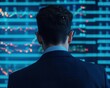 © Creator88 - Wealth manager analyzing a digital screen filled with rising financial graphs and symbols of abundance