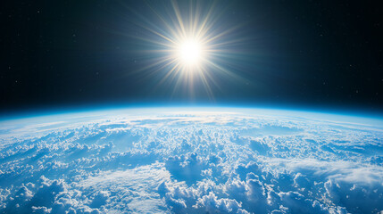Wall Mural - clouds on planet earth from space, rising shining sun, satellite view of stratosphere cloudscape