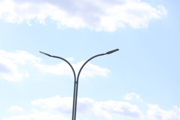 street lamp on blue and cloudy sky