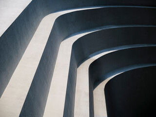 Fototapete - Concrete wall curve Architecture details Grey texture background Monochrome