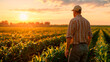 © Александр Марченко - Farmer standing in cornfield admiring his crop