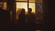 © BerkahStock - A couple enjoying a sunset together by a window, creating a romantic atmosphere.