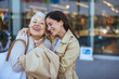© Dragana Gordic - Happy Grandmother and Granddaughter Embracing Outdoors in City