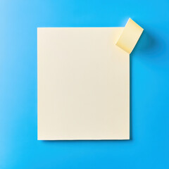 A blank adhesive note on blue background, perfect for messages or reminders. simplicity of design evokes sense of organization and creativity