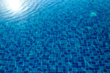 Underwater empty swimming pool background with copy space