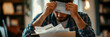 © Ram - Young man stressed over bills, reviewing financial documents, overwhelmed by personal finances, managing debts, frustrated while calculating expenses, financial stress, struggling with budgeting