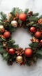 © fourtakig - Vertical frame of a festive wreath adorned with ribbons, ornaments, and evergreen sprigs