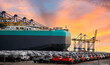 © Rangsarit - Close up vehicle carrier vessel loading car for shipping to worldwide, Large RoRo (Roll on off) vehicle car carrier, New car lined up in the port for import export around the world.