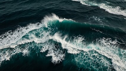 Poster - Aerial view of ocean waves crashing against a rugged coastline.