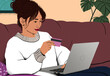 © Connect Images - A woman sits comfortably on a couch, holding a credit card while using a laptop, possibly shopping online.