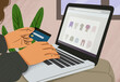 © Connect Images - Hands holding a credit card and typing on a laptop with online shopping interface displayed on the screen.
