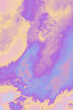 © Connect Images - Abstract pastel background with soft purple, pink, and blue hues blending together in a dreamy cloud-like formation.