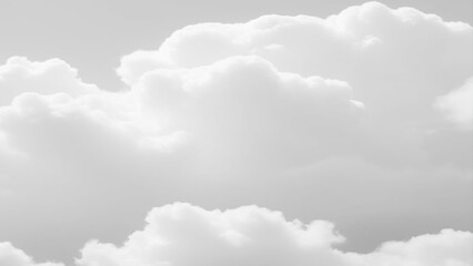 Wall Mural - White Clouds from above. Aerial view of the fluffy white cloud on blue sky. Top view from an airplane over white clouds
