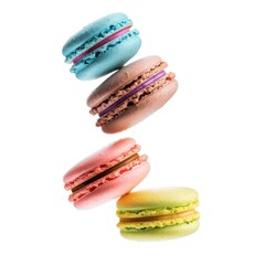 Canvas Print - Colorful French macarons floating gracefully.