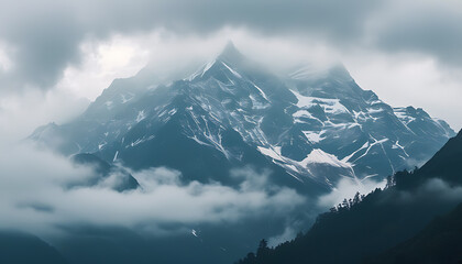 Wall Mural - Majestic mountains wrapped in mist.