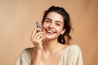 © Rawpixel.com - Smiling woman cosmetics applying perfume.