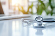 © Jacek - Stethoscope on a white table with a medical background.