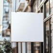 © Johannes - blank white hanging sign on building, Mock up of a white blank empty square Signboard for store, cafe, restaurant name and logo Mock up Signage front shop square shape logo sign