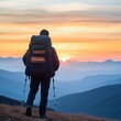 © Photo18@desing - Hiker's silhouette against a panoramic mountain sunrise, carrying multi-pocketed backpack, hiking trail gear, early morning adventure