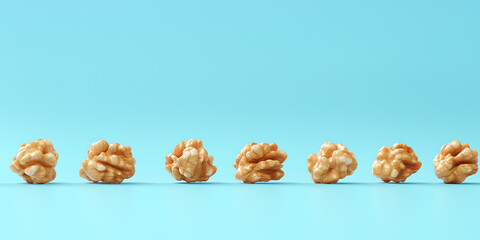 Wall Mural - Nut clusters lined up in a row on a clean surface, sweet illustration