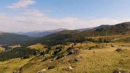 Wall Mural - Aerial view of the Carpathian Mountains in Romania. Transalpina. Drone video of one of the most iconic Parang mountains. Top cinematic aerial view