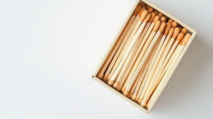 Wall Mural - Box filled with new matchsticks placed on a white background