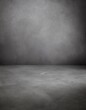 © Artbi - Textured gray photography studio background with depth of field for a dramatic effect
