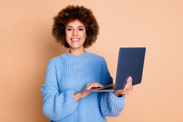 Canvas Print - Photo of cheerful adorable girl with chevelure dressed blue knit sweater holding laptop read email isolated on pastel color background