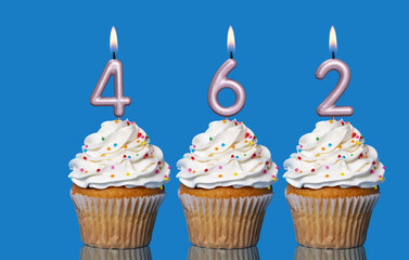 Birthday Cupcakes With Candles Lit Forming The Number 462