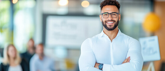 A confident professional smiling in modern office setting.