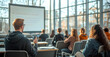 © ClicksdeMexico - A group of students sit in a classroom with a large screen in front of them