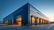 © otwdesign - Modern Warehouse Building with Multiple Loading Docks at Dusk