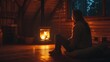 © BerkahStock - A person sitting by a warm fireplace in a cozy cabin, enjoying a peaceful evening.
