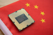 © pla2na - Chinese flag made of CPU computer (central processing unit). US vs China chip war or tech war, semiconductor industrial competition concept. US restrict and control chip export to China.