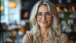 © Vertigo Images - Smiling woman with gray hair wearing glasses