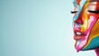 © Trusha - A woman with colorful face paint is the main focus of the image. The background is a light blue color, and the woman's face is painted in a rainbow of colors. Concept of creativity and self-expression