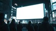 © Thanthara - many people looking at blank LED billboard mockup in night city street
