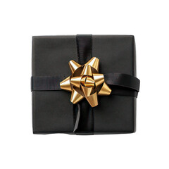 Wall Mural - A black gift box with a shiny gold bow, symbolizing celebration and giving.