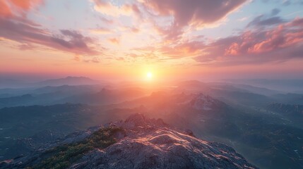 A beautiful sunset over a mountain range with a lake in the foreground