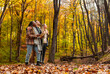 © Zoran Zeremski - Three friends having fun and enjoying hiking in forest lookig up.