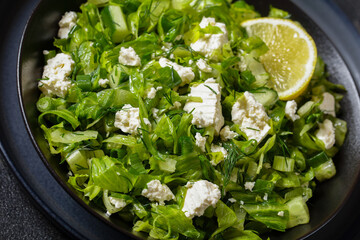 Canvas Print - Classic Greek green lettuce salad with feta cheese